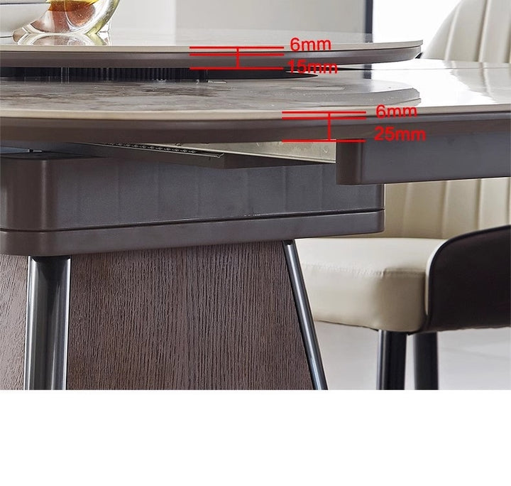 Close-up of a modern dining table base with glass and marble layers, showing thickness measurements in millimeters.