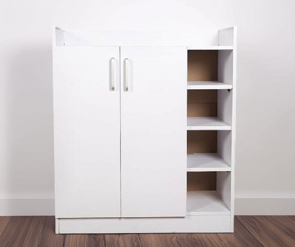 Modern white storage cabinet with dual doors and open side shelves on wooden floor