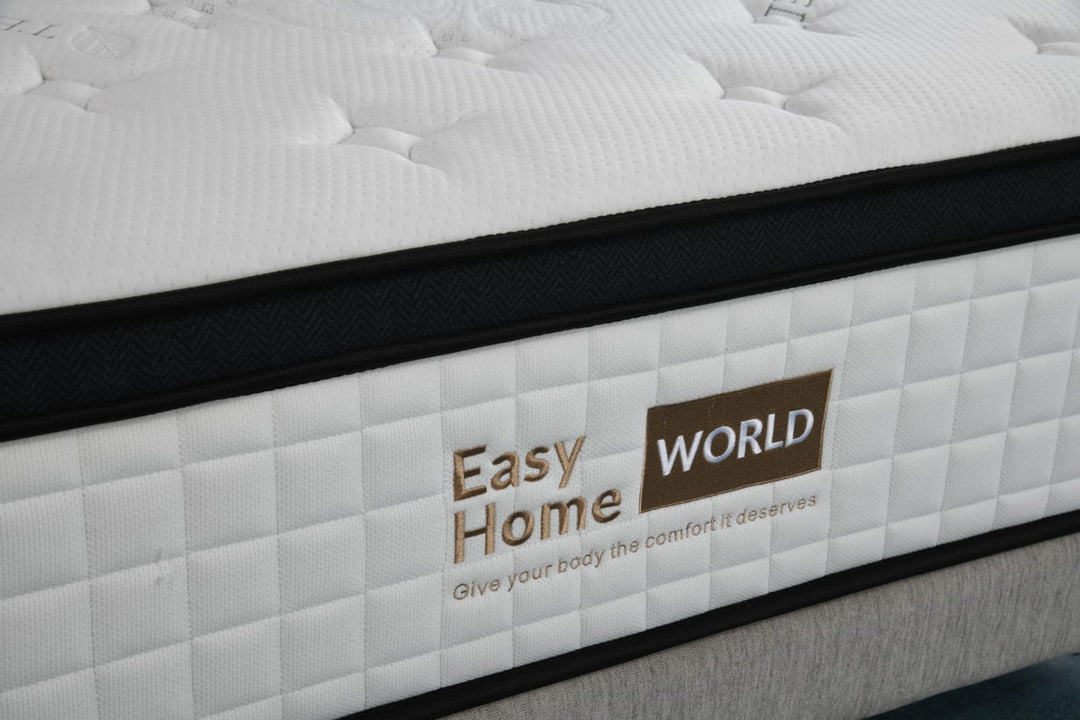Close-up of a modern quilted mattress labeled Easy Home World on a bed base