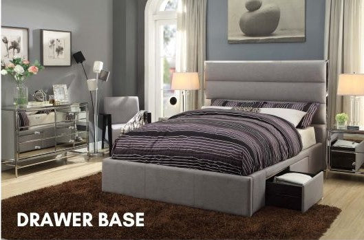 Light grey upholstered bed with 4 drawer storage base in modern bedroom setting