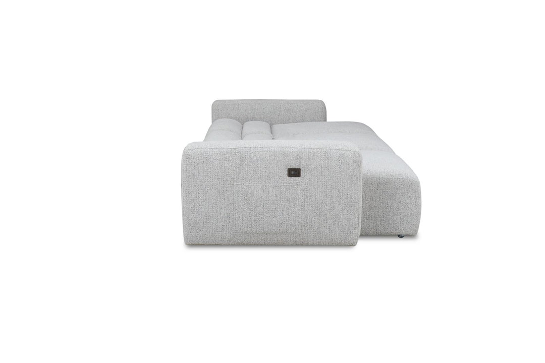 Modern light gray fabric sectional sofa with chaise lounge and tufted seat, side power outlet