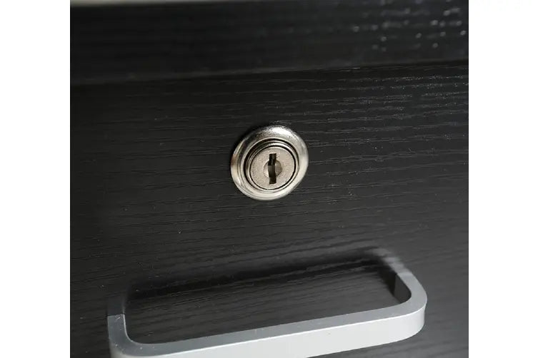 Black wood drawer with silver handle and keyhole lock