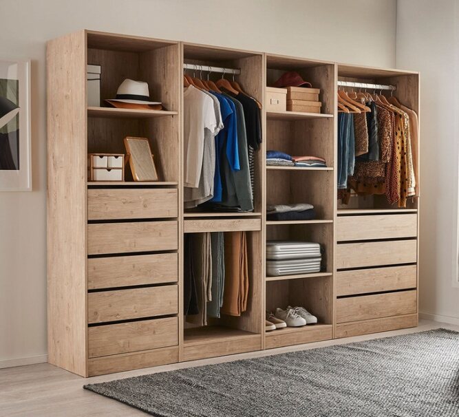 Modern wooden wardrobe closet with clothes, drawers, and open shelves in a bedroom setting