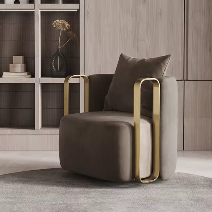 Modern velvet armchair with gold metal frame, perfect for living room or lounge seating