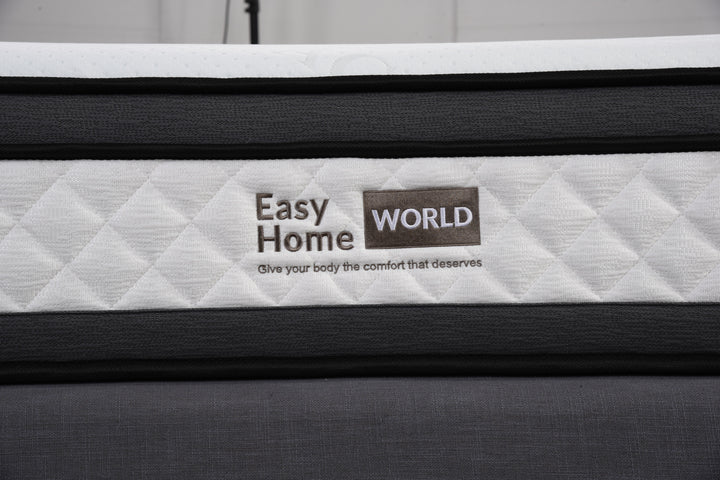 Close-up of quilted mattress with Easy Home World logo, modern bedding texture visible.
