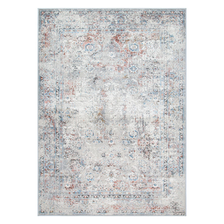 Distressed area rug with faded floral pattern in blue, grey, and rust tones, home decor.