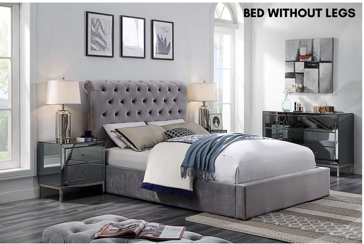 Modern grey gas lift bed without legs, upholstered headboard, in stylish bedroom setting