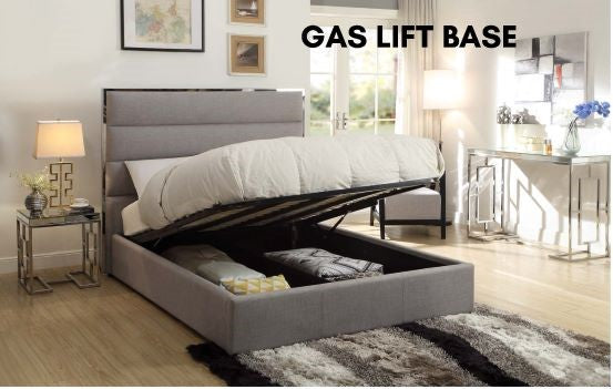 Light grey upholstered gas lift storage bed in modern bedroom setting