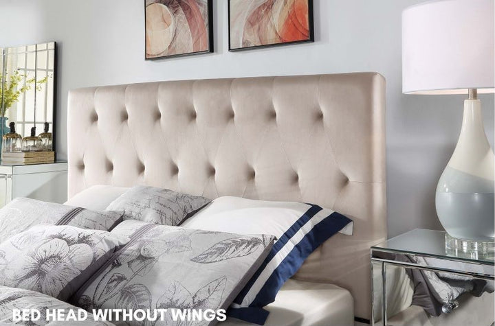 Beige tufted upholstered bed headboard without wings in modern bedroom setting