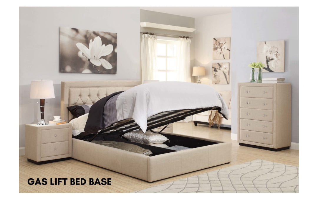 Modern bedroom with beige gas lift storage bed, matching nightstand and dresser, and neutral decor.