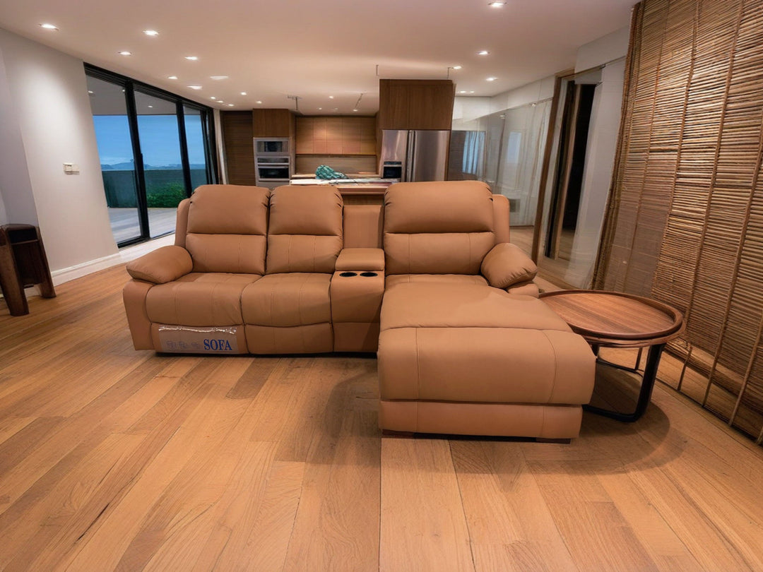 Tan leather recliner sofa with chaise lounge and cup holders in modern living room