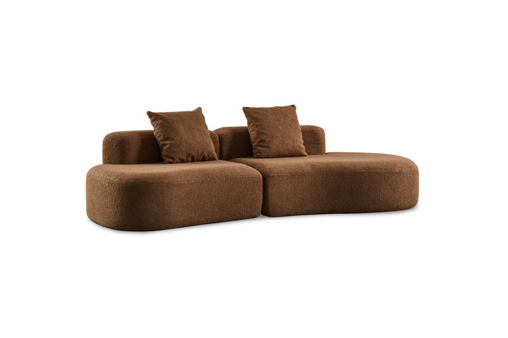 Modern brown fabric sofa with two matching backrest pillows, curved modular design