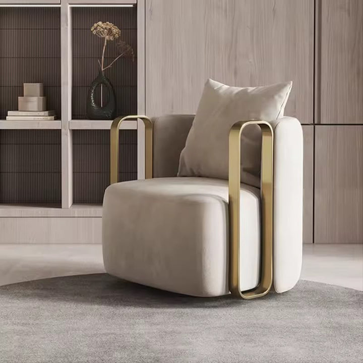 Modern beige armchair with gold metal frame, perfect for living room or lounge space
