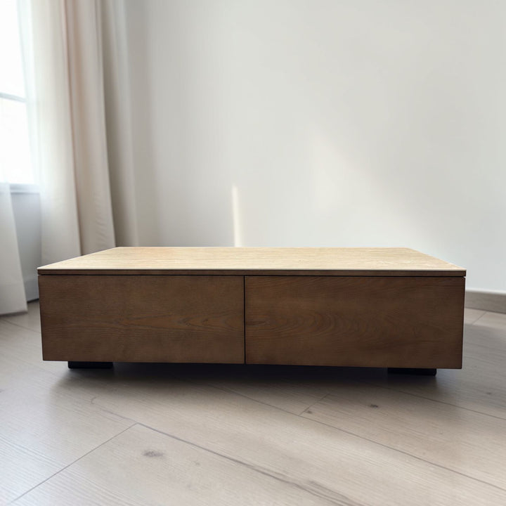 Modern wooden coffee table with storage in a bright living room