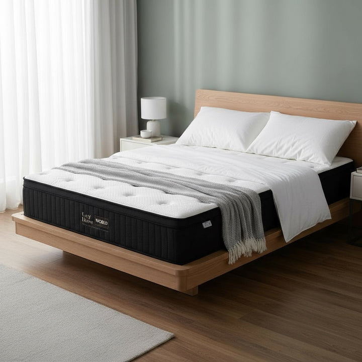 Modern bedroom with a platform bed, thick mattress, white bedding, and nightstands